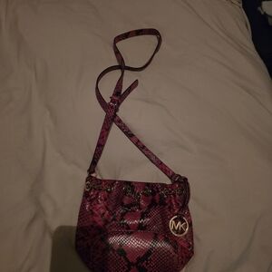 Michael Kors Mini Frankie Drawstring Crossbody Bag in Raspberry